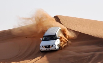 Private Transfer Dubai Red Dunes Desert Safari with Live Shows and BBQ Dinner